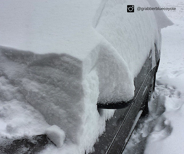 Snowy Car in garage organization