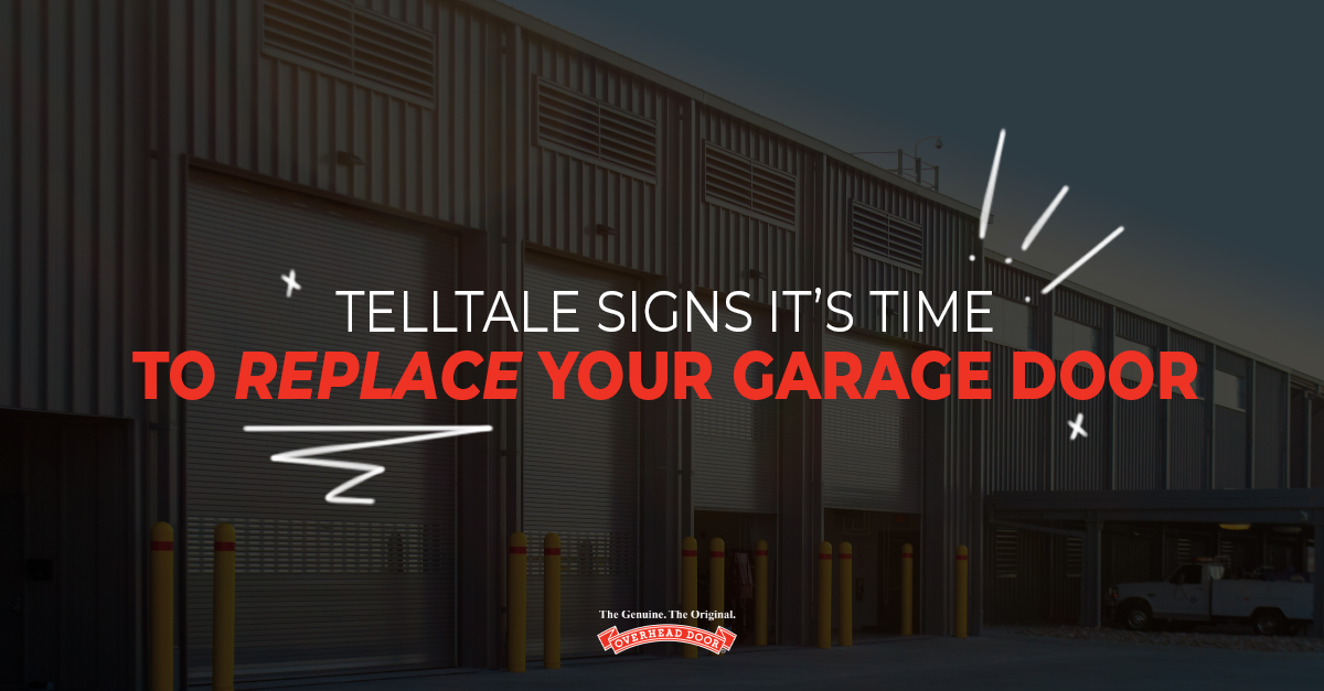Building with overhead garage doors and text over the photo saying "Telltale Signs it's Time To Replace Your Garage Door"