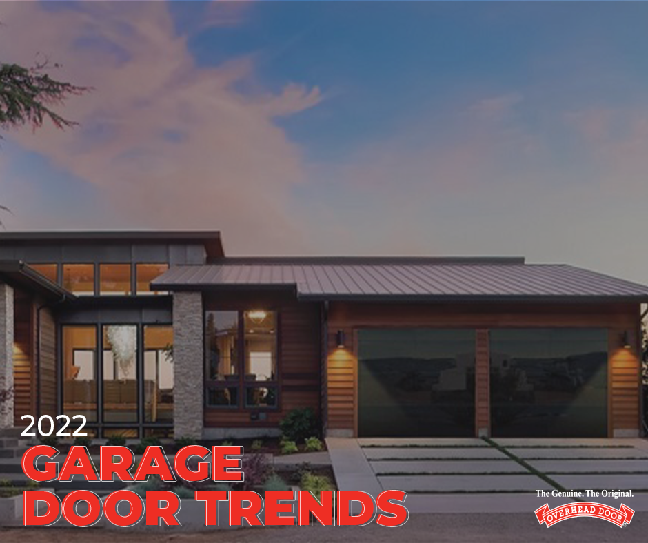 Modern house with big front windows and a two stall garage. 