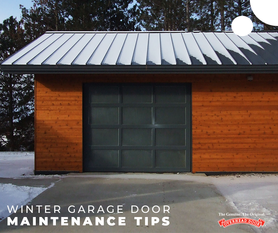 Black and Wood Garage With a Snow Covered Roof